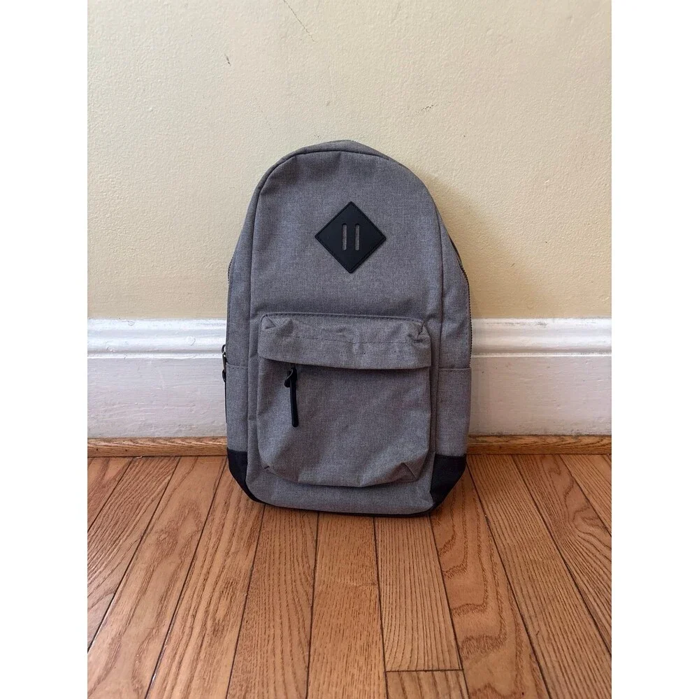 Backpack sling bag crossbody pockets gray black adjustable travel hiking teen